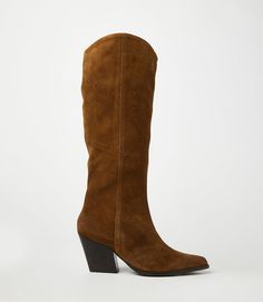 Crafted from soft suede, these pointed toe Western high boots are the perfect addition to any fall wardrobe. Pair them with jeans, skirts, or dresses for a versatile and stylish look that's perfect for the season's colors. With a sleek design and comfortable fit, these boots are a must-have. True to size Upper/Lining: Leather Heel height: 3" Platform: 0.25" Shaft Height: 17" Shaft Circumference: 14.5" Pointed toe shape Full zipper closure at inner ankle Imported Seychelles | Karen Kane Pointed T Western Knee-high Boots With Suede Lining For Fall, Fall Suede Pointed Toe Boots, Fall Suede Boots With Pointed Toe, Brown Suede Heeled Boots For Fall, Fall Suede Knee-high Boots With Pointed Toe, Fitted Western Suede Knee-high Boots, Suede Knee-high Boots With Pointed Toe For Fall, Winter Suede Knee-high Boots With Snip Toe, Suede Knee-high Boots With Stacked Heel And Pointed Toe