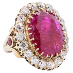 Ruby ring set with an oval ruby weighing approximately 12 carats, and 2 pear shape rubies weighing approximately 0.50 carats. The oval ruby is surrounding with approximately 3 carats of old mine cut diamonds. Size 4 1/2. Can be sized. Goa Jewellery, Ruby Ring Set, Ruby Jewellery, Cheap Diamond Rings, Colorful Gemstones, Ruby Rings, Antique Diamond Rings, Ruby Jewelry, Childrens Jewelry