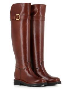 Cognac soft leather women's over-the-knee Boot by Chloè, featuring by an oversized strap with a gold-coloured buckle. Serrated rubber sole. Lined interior. internal rise. Heel: 5 cm Leg height: 49 cm Circumference: 40 cmComposition: Leather Luxury Leather-lined Knee-high Boots For Work, Luxury Knee-high Boots With Leather Lining For Work, Luxury Calf Leather Knee-high Boots With Leather Lining, Luxury Knee-high Calf Leather Boots With Leather Lining, Luxury Leather Knee-high Boots For Business, Luxury Knee-high Boots With Leather Sole For Business, Luxury Brown Knee-high Boots For Business, Luxury Leather-sole Knee-high Boots For Fall, Classic Calf Leather Knee-high Boots With Leather Sole