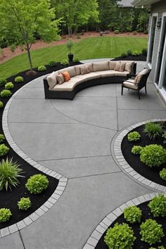 an outdoor patio with seating and landscaping