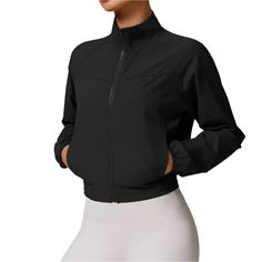 Stay stylish and comfortable in our Mid-Length Athletic Jacket. With side and interior pockets, a high collar, and a full zip, it's the perfect mix of function and fashion. Plus, the pleated back adds a slender fit while remaining breathable. Product Details: Nylon/Spandex Mid- Length Side pockets and interior pocket High collar Full length zipper Pleated back with a cinched waist Breathable Quick Drying Windproof Imported Fall Stretch Outerwear In Solid Color, Fall Stretch Solid Color Outerwear, Sporty Fitted Windbreaker For Fall, Solid Sports Outerwear With Side Pockets, Sporty Fitted Fall Windbreaker, Stretch Long Sleeve Track Jacket With Pockets, Solid Outerwear With Side Pockets For Sports, Fitted Solid Color Long Sleeve Windbreaker, Solid Fitted Long Sleeve Windbreaker