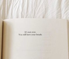 an open book with the words it's not over you still have your breath