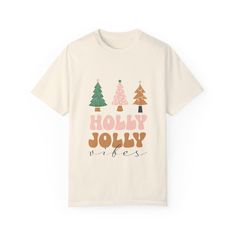 **Holly Jolly Christmas T-Shirt | Festive Holiday Apparel | Perfect for Celebrating the Season** Spread the festive cheer with our delightful **Holly Jolly Christmas T-Shirt This fun and comfy tee is perfect for all your holiday activities, whether you're decorating the tree, attending holiday parties, or enjoying cozy nights at home. It's a wonderful way to celebrate the most wonderful time of the year! **Product Details -  Design Features a vibrant "Holly Jolly Christmas" graphic, beautifully Winter T Shirt, Winter T Shirts, Shirts Cute, Holly Jolly Christmas, Comfy Blankets, Holiday Apparel, Merry Christmas Shirts, Jolly Christmas, Holiday Shirt