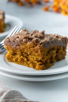 a piece of cake on a plate with a fork