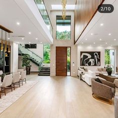 a living room filled with furniture and a fire place in the middle of a room