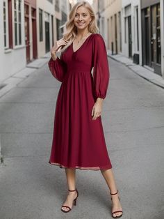 Step into any cocktail party or special event with confidence in this stunning Chiffon V-Neck Long Sleeves Elastic Band Midi Dress. The combination of the flowing chiffon fabric, v-neckline, and long sleeves exudes a classy and refined vibe. Complete your look with heels and accessories for a memorable appearance that will turn heads all night long. Fit: Please refer to size chart. Length: Midi length. Sleeve Style: Long sleeves. Closure: It is concealed a zipper up the back. Undergarments: It i Solid V-neck Chiffon Dress, Flowy Solid Chiffon V-neck Dress, Flowy Solid Chiffon Dress With V-neck, Solid Chiffon V-neck Dress, Solid Color Flowy V-neck Chiffon Dress, Elegant Flowy Chiffon V-neck Dress, V-neck Chiffon Bridesmaid Dress, Elegant Flowy Chiffon Dress With Surplice Neckline, Flowy Chiffon V-neck Dress For Party