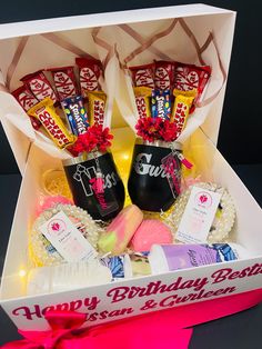 a birthday gift box filled with candy, candies and other items for someone's special occasion