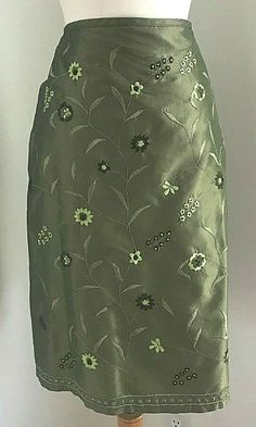 Brand:  NY & Co. Item:  NY & Co Silk Skirt Embroidered Floral Design, Lined, Back Zip  Size:  Women's 8  Color:  Shades of Green  Condition:  Pre-loved.  Excellent. Green Embroidered Summer Skirt, Green Embroidered Skirt For Summer, Green Silk Skirt, Silk Skirts, Skirt Floral, Embroidered Skirt, Silk Skirt, Green Silk, Embroidered Silk