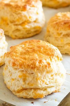 several biscuits on a baking sheet ready to be baked in the oven or served for breakfast