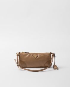 Cameo Prada Re-edition 2002 Small Leather Shoulder Bag | PRADA Shoulder Bag Prada, Bags Prada, Prada Re Edition, Bag Prada, Minimalist Accessories, Prada Shoulder Bag, Luggage Bags Travel, Mens Travel Bag, Leather Keyring