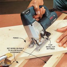 a person using a planer to cut wood with the help of an electric tool