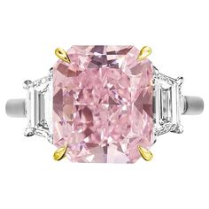 A truly remarkable piece of fine jewelry: an exquisite GIA Certified 8 Carat Fancy Brown Pink Diamond Ring, elegantly set with two trapezoids, nestled within a combination of solid platinum and 18 carats yellow gold. This extraordinary ring features a main stone certified by GIA, ensuring its authenticity and quality. The captivating hues of the Fancy Brown Pink diamond are complemented perfectly by the brilliance of the trapezoid side stones. Crafted with meticulous attention to detail, the combination of platinum and 18 carats yellow gold adds a touch of luxury and sophistication to this stunning piece. Elevate your style with this unique and elegant Fancy Brown Pink Diamond Ring, a testament to exquisite craftsmanship and timeless beauty. Fancy Pink Diamond Ring, Dig Jewelry, Luxury Stuff, Heart Shaped Diamond Ring, Pear Cut Diamond Ring, Stunning Aesthetic, Oval Cut Diamond Rings, Bling Ideas, Ladies Rings