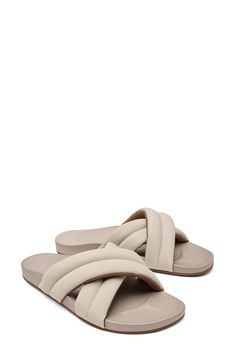 Thick, padded straps soften the look of this beach-ready sandal crafted with an arch-supporting anatomical midsole footbed and a grippy, nonmarking sole. Flat sole Water-resistant Cushioned footbed with arch support Synthetic upper and lining/rubber sole Imported Beige Cushioned Slide Flip Flops, Beige Cushioned Flat Flip Flops, Beige Cushioned Flip Flops, Beige Slide Sandals With Cushioned Footbed, Beige Cushioned Slide Sandals, Comfortable Beige Sandals With Ortholite Insole, Comfortable Beige Synthetic Sandals, Beige Slip-on Sandals With Arch Support, Beige Slides With Arch Support And Round Toe