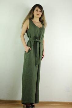 Linen jumpsuit with belt and 2 pockets in green color,  perfect for casual wear and  suitable for any occasion in any season Details:- 100% natural  linen produced  in Europe ;- medium weight (180 gram per square meter);- color:  green, could be any from our  colors catalog (color samples at the photo);  Made to order, approximately  a few days, If you have any questions please message me and I will be glad to answer.Size guide :Size  XSBust: fits bust around 33”-34”/ 84-88 cmWaist: fits waist a Green Linen Casual Jumpsuits And Rompers, Casual Green Linen Jumpsuits And Rompers, Green Linen Jumpsuits And Rompers For Spring, Spring Green Linen Jumpsuits And Rompers, Casual Linen Belted Jumpsuits And Rompers, Spring Linen Belted Jumpsuits And Rompers, Green Belted Jumpsuits And Rompers For Summer, Summer Green Belted Jumpsuits And Rompers, Casual Green Jumpsuits And Rompers With Tie Waist