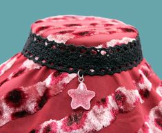 Elevate your style with these enchanting star chokers, perfect for adding a whimsical touch to any outfit. These chokers are designed with both elegance and comfort in mind, offering a unique accessory for any occasion. Product Details: Material: High-quality lace and durable stainless steel clasp. Weight: Ultra-lightweight at just 0.15 oz, ensuring all-day comfort. Length: Adjustable to fit most neck sizes. Design: Adorned with a charming star pendant, each choker showcases a blend of elegance and whimsy. Choker Options: Charm Colors: Available in three distinct colors to match any outfit. Styles: Choose from three different choker designs for a personalized touch. Features: Lightweight & Comfortable: Designed for extended wear without any discomfort. Durable & Hypoallergenic: Made with h Trendy Star Charm Choker As Gift, Trendy Choker With Star Charm For Gift, Adjustable Star Choker For Festival, Adjustable Star-shaped Choker For Festivals, Adjustable Star Choker, Star Charm Choker, Adjustable Star-shaped Choker For Gift, Adjustable Star Shaped Choker For Gift, Adjustable Star Shaped Choker As A Gift