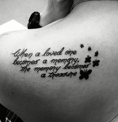 a woman with a tattoo on her back saying, when a loved one becomes a memory, the memory begins a treasure