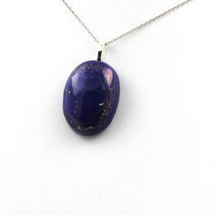 Lapis Lazuli necklace + stainless steel chain length 40, 45, 50, 55, 60, 70, 80, 90 cm to choose from. Average Weight (Carats): 64.91 ct Size (mm): 36 x 20 x 9mm Unisex jewelry for women, men and children Delivered in a gift box Ref. : SKU050928 Oval Necklace With Large Stone For Gifts, Gift Necklace With Large Oval Stone, Oval Pendant Necklace With Large Stone For Gift, Large Stone Oval Pendant Necklace For Gifts, Handmade Oval Lapis Lazuli Necklace, Spiritual Oval Cabochon Necklace, Gift Necklaces With Oval Cabochon Natural Stones, Oval Cabochon Necklaces With Natural Stones For Gifts, Gemstone Oblong Necklace For Gift