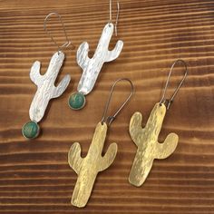 Did you know that all of our jewelry is handcrafted in Arizona? We love this beautiful desert state! 1.5” Saguaros, hand drawn, cut and textured. Available in Sterling Silver with Green Kingman Turquoise or Brass with Surgical Steel Ear Wires. Beautiful Desert, Cactus Earrings, Earring Ideas, Kingman Turquoise, Ethereal Beauty, Turquoise Earrings, Ear Wires, Wrap Bracelet, Sterling Silver Earrings