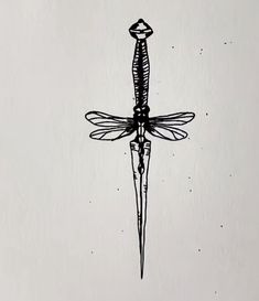 a black and white drawing of a dragonfly