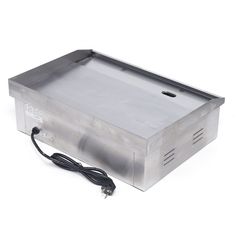 a stainless steel box with a power cord plugged into it