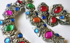 Multi Color Mogul Cabochon Bracelet Earring Set, Dangles, Antique Silver Tone, Vintage - Etsy Multicolor Cabochon Costume Jewelry, Vintage Multicolor Cabochon Jewelry, Multicolor Jeweled Costume Jewelry Earrings, Multicolor Cabochon Bracelet, Metal Bracelets With Multicolor Jeweled Details, Multicolor Metal Jewelry For Party, Multicolor Nickel-free Retro Jewelry, Multicolor Nickel-free Costume Jewelry, Multicolor Metal Costume Jewelry Earrings