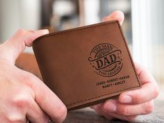 Looking for the perfect Dad Christmas Gift? Surprise Dad with a stylish and practical wallet that he'll love! Color Options: Choose from 5 colors to match any style. Design Choices: Select from 3 unique designs to fit his personality. Versatile Storage: Holds both money and credit cards securely in one convenient place. Compact Size: Perfectly sized at 3.5" x 4.25" to fit comfortably in his pocket. Give Dad a gift that combines function and fashion. This wallet is the ideal way to show your appr Father's Day Gift Trifold Wallet With Rfid Blocking, Embossed Brown Wallets As Gift, Bifold Wallet As Father's Day Gift, Bifold Wallet For Father's Day Gift, Father's Day Gift Bifold Wallet, Bifold Wallet For Father's Day, Father's Day Bifold Wallet Gift, Father's Day Gift Trifold Wallet With Card Slots, Embossed Rectangular Wallets For Gifts