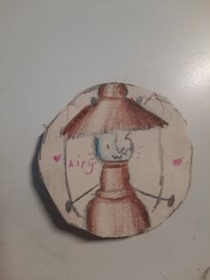 a drawing of a lamp on top of a table