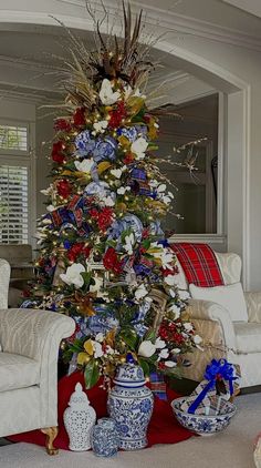 a decorated christmas tree in a living room