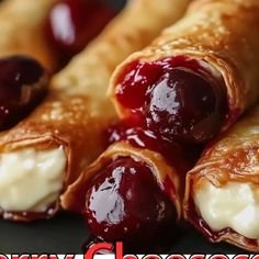 crepes with cream cheese and cherries are stacked on top of each other