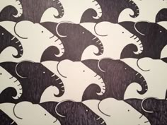 an image of many elephants in the same pattern on a white and black background or wallpaper