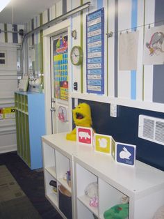 a child's playroom with stuffed animals and toys on the shelves in it