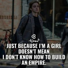 a woman walking down the street with her hand in her pocket and text that reads just because i'm a girl doesn't mean i don't know how to build an empire