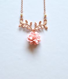 "2018 COLLECTION, a nature inspired necklace featuring blush Dahlia flower dangled on metal branch. If you prefer different color, please drop a note. Detail : - Hand sculpted Dahlia made of Polymer Clay . Size approx: 16-17mm. - Rose Gold plated over brass branch. - Cream Swarovski Pearls - Gold Plated over brass chain as pictured, silver plated, rose gold available. - Entire length 16\" + 2 extenders. - Handmade in The USA - Made to order in 3-4 business days. If you need earlier shipping date Delicate Pink Pendant Flower Necklace, Delicate Pink Flower Pendant Necklace, Rose Gold Flower Pendant Necklace, Nature-inspired, Rose Gold Flower Pendant Necklace Nature-inspired, Rose Gold Nature-inspired Flower Pendant Necklace, Rose Gold Flower Pendant Necklace, Nature-inspired Rose Gold Necklace, Handmade Pink Nature-inspired Necklace, Blush Flower Jewelry Gift