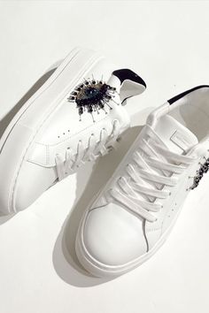 Item #20193187 Extended Sizes From Kurt Geiger London, the Laney Eye Leather Sneakers feature: Leather upper Embellished eye design Lace-up styling Fabric lining Synthetic outsole Imported. DMS: 0646 176 8487310109 Embellished Leather Lace-up Sneakers, Embellished Leather Sneakers With Round Toe, Embellished Leather Sneakers, Embellished Leather Sneakers For Party, Leather Dress Shoes, Eye Design, Kurt Geiger, Platform Sneakers, Family Matching