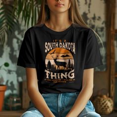 This South Dakota deer hunting t-shirt captures the essence of the great outdoors. With its soft and durable fabric, this classic fit shirt is perfect for everyday wear or outdoor adventures. Ideal for hunters or nature enthusiasts, this t-shirt is a great addition to any wardrobe, especially during hunting season. Product features - Soft and durable ring-spun cotton fabric - Classic fit with crew neckline for versatile style - Ethically grown and harvested US cotton - Available in various fabric blends for different colors - Pearlized tear-away label for comfort Care instructions - Do not dryclean - Machine wash: warm (max 40C or 105F) - Do not bleach - Tumble dry: low heat - Iron, steam or dry: low heat Adventure Outfit, Hunting Season, Deer Hunting, South Dakota, Great Outdoors, Versatile Style, Outdoor Adventure, Outdoor Adventures, Vintage Tshirts