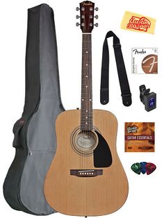 an acoustic guitar is shown with accessories