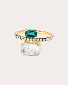 Forged in solid 18-karat gold, this pavé-embellished ring features a dimensional sapphire crystal face filled with an array of loose white diamonds. A baguette-cut emerald balances on the other side of the band, creating enviable color. From Moritz Glik’s Core Collection, the Kaleidoscope Shaker™ in its purest form. Kaleidoscope Shaker™ face 18k yellow gold, white sapphire crystal, emerald and white diamond Carat: 0.48 ctw emerald, 0.75 ctw diamond Diamond cut: round Emerald cut: emerald Clean w Moritz Glik Ring, Luxury Bezel-set Open Emerald Ring, Pure Form, Diamond Carat, Baguette Cut, White Sapphire, Emerald Ring, White Diamonds, Sapphire Crystal