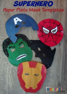 four paper plate masks with the faces of superhero and iron man on them, all in different colors