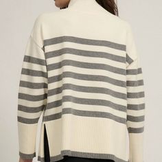 a striped, knit sweater top with a high collar, drop shoulder, and side slits material: 50% vcs / 28% polyester / 22% nylon color: grey/cream model is 5’9 / wearing a small Rib Knit Sweater, Striped Knit Sweater, Ribbed Knit Sweater, Striped Knit, High Collar, Drop Shoulder, Knit Sweater, Sweater Top, Rib Knit