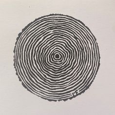 a black and white photo of a fingerprint in the shape of a tree ring