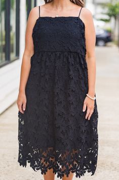 With a chic and timeless black lace design, this midi dress is the perfect choice for any special occasion! Featuring adjustable spaghetti straps and a square neckline, this dress exudes sophistication and elegance! Turn heads and make a statement by pairing it with your favorite clutch and heels! 100% Polyester Square Neck Lace Patchwork Party Dress, Chic Lace Dress With Square Neck, Chic Square Neck Lace Dress, Elegant Formal Lace Dress With Square Neck, Chic Lace Dress With Square Neck For Parties, Chic Square Neck Lace Dress For Party, Spring Black Dress For Wedding Guest, Chic Lace Dress With Lace Closure For Date Night, Elegant Lace Top Dress For Brunch