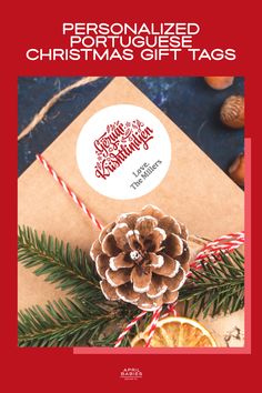 personalized christmas gift tags with pine cone and candy canes on the table next to an envelope