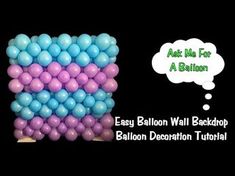 balloons are arranged in the shape of an eiffy balloon wall with a thought bubble above it