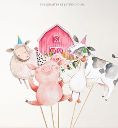 a group of farm animals standing on top of sticks