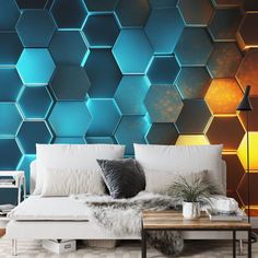 a living room scene with focus on the couch and hexagonal wallpapers