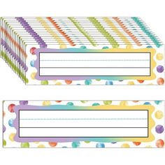 two colorful striped name tags with dots on the front and back of each tag, one has