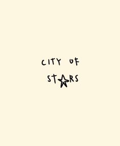 the words city of stars written in black ink