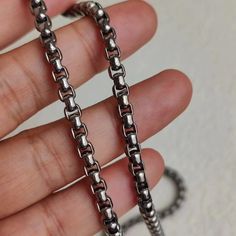 4 MM Wide Pure Titanium Box Necklace -Material: pure titanium  -Wide: 4MM -Length: 18 cm , 21cm , 60 cm , 65 cm , 70 cm ect -Lobster clasp is also titanium material If you have sepcial requirement in the length , please contact us , we accept customized length. Round Gunmetal Stainless Steel Jewelry, Gunmetal Metal Jewelry With Box Chain, Durable Metal Necklace As Gift, Durable Metal Necklaces As A Gift, Durable Metal Necklaces For Gifts, Durable Metal Necklace Gift, Durable Silver Jewelry Gift, Gunmetal Link Jewelry In Stainless Steel, Gunmetal Box Chain Jewelry As Gift