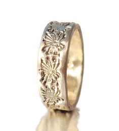 #jewelry #rings #bands #silverjewelry #silverrings #dandelionring #venexiajewelry #engagementband #weddingband #romanticring #onsale #ringforher #floraldesignring #flowerembossedring #silverband #handmadejewelry Dandelion Ring, Dandelion Field, The Dandelion, Romantic Rings, Antique Silver Rings, Nature Inspired Rings, Cluster Bracelets, Ring Flower, Nature Ring