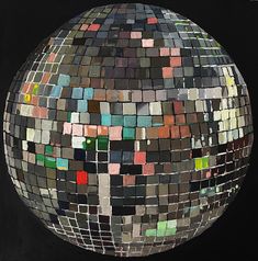 an abstract painting of a disco ball made up of many different colored squares and rectangles